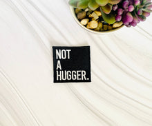 Load image into Gallery viewer, R &amp; R Stitched - Not a hugger embroidered iron-on hat patch
