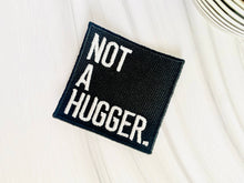 Load image into Gallery viewer, R &amp; R Stitched - Not a hugger embroidered iron-on hat patch
